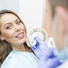 Implant dentar București pentru femei la Complet Dental (P)