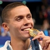Aur și glorie pentru David Popovici! Câți bani îi aduce dublul triumf mondial