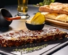 Scăriță de porc la cuptor. Rețeta perfectă pentru o masă delicioasă