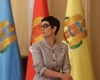 Cine este Delia Dinu, mâna dreaptă a lui Băsescu, Iohannis și Bolojan. Bruneta de la Cotroceni întorcea mereu toate privirile cu aparițiile sale