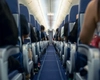 Pasager în zbor low-cost, surprins dormind pe podeaua avionului. Imaginile au devenit virale