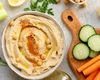 Rețeta de hummus cu năut din conservă! Iată ce trebuie să faci pentru a ieși cremos!