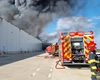 Incendiu pe A1. Flăcările au cuprins o hală