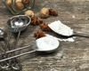 Care este diferența dintre bicarbonat de sodiu și praf de copt? Când și de ce se folosește fiecare ingredient