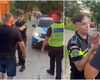 Polițist atacat de săteni furioși după ce a oprit un tânăr beat pe ATV! A fost nevoie să-și scoată pistolul