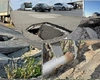 Imaginile unui dezastru! Sute de oameni își riscă viața zilnic, când trec peste acest pod. Plăcile de beton sunt sparte, iar barele de fier abia se mai țin