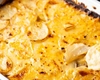 Cartofi la cuptor cu cașcaval și smântână – Rețetă simplă și delicioasă, ideală pentru orice ocazie