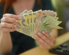 Ce salariu minim pe economie net au românii? Iată câți bani primesc salariații în 2026 și ce schimbări vor avea loc!