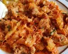 Cea mai delicioasă rețetă de varză murată călită cu carne de porc la cuptor. O rețetă inedită și plină de gust