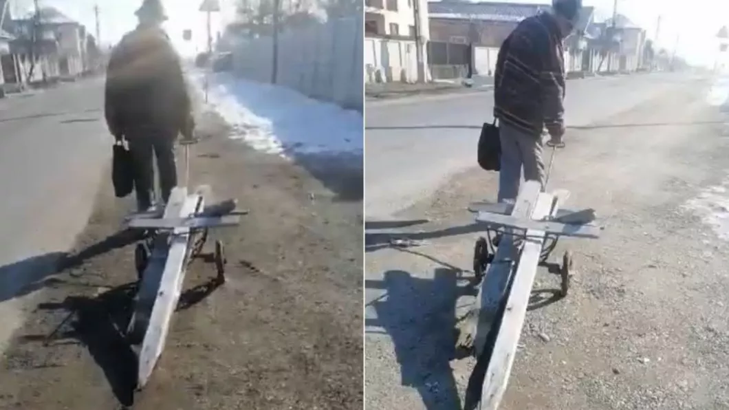 Un bătrân din județul Olt surprins când fură crucile dintr-un cimitir pentru a face focul acasă - VIDEO