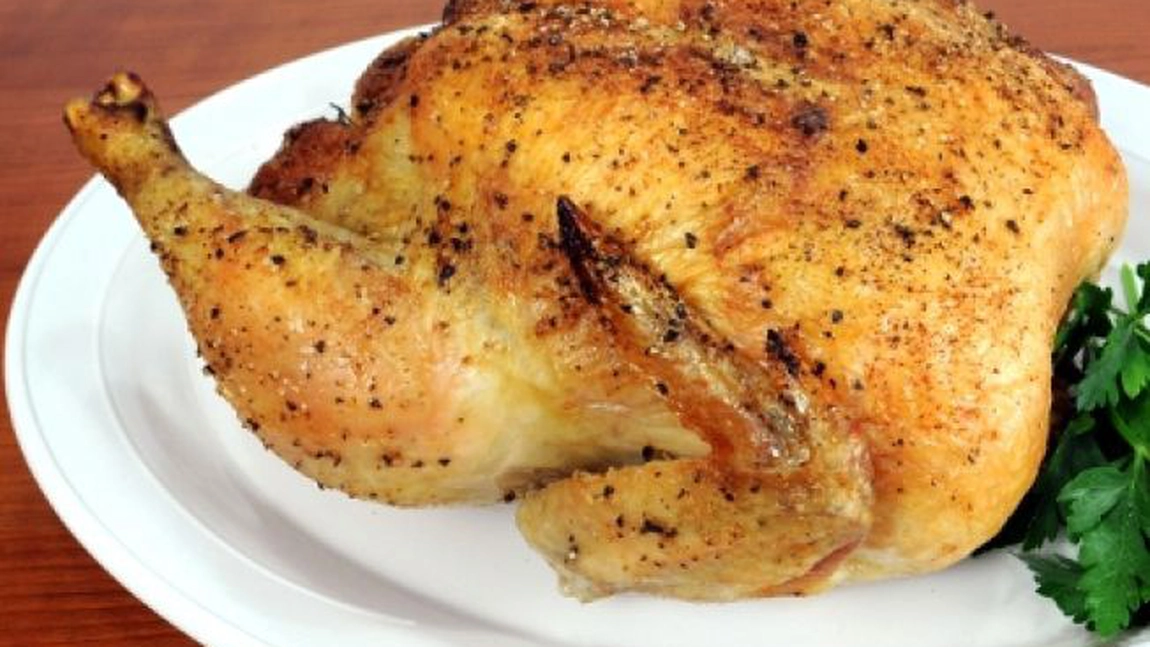 Pui intreg la cuptor cu usturoi si ceapa