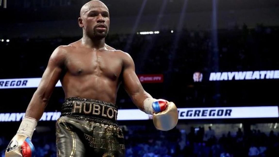 Floyd Mayweather, provocat de un alt dublu campion mondial din UFC, care e suspendat pentru dopaj