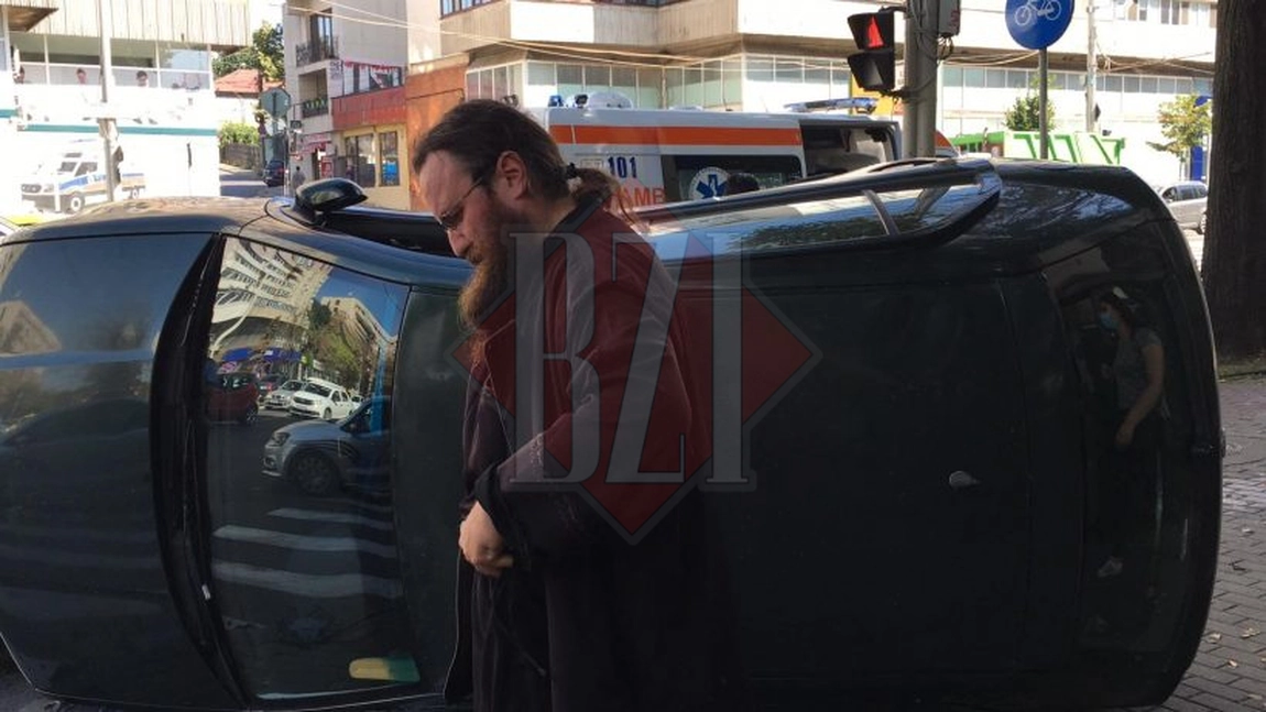 Un preot din Suceava s-a răsturnat cu maşina în Iași. Accident spectaculos în municipiu, după ce un șofer de taxi a urcat băut la volan - FOTO, VIDEO (EXCLUSIV)