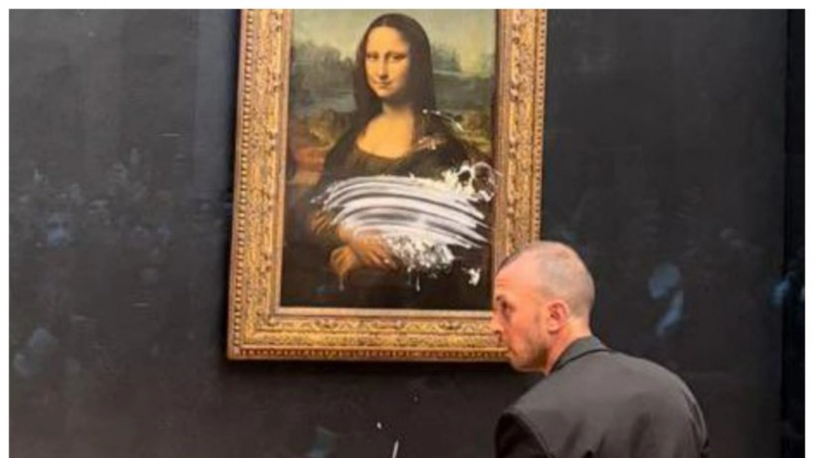 Un bărbat a aruncat o prăjitură în Mona Lisa din Luvru