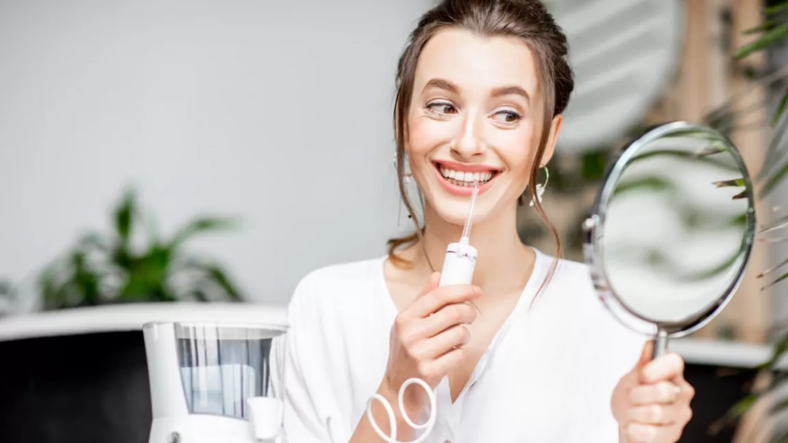 Care sunt beneficiile unui duș bucal pentru igiena dentară. Cum să alegi un irigator potrivit pentru dantura ta