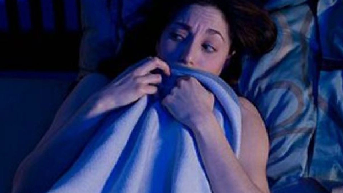 femeie cu insomnie