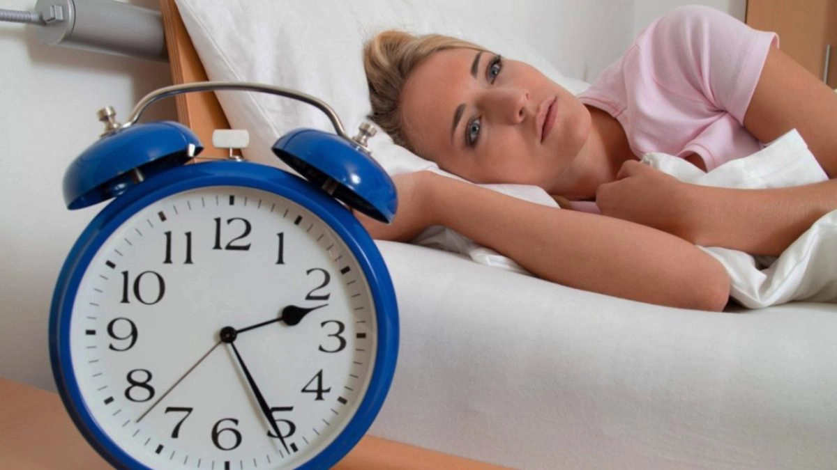 femeie cu insomnie