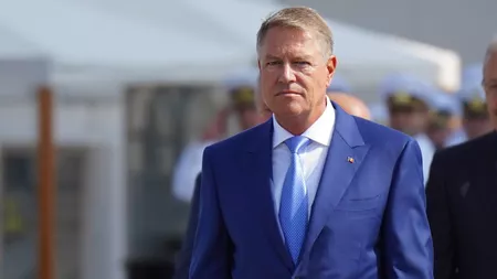 Klaus Iohannis trimite Parlamentului, spre reexaminare, legea care impune OMV să plătească taxa de solidaritate