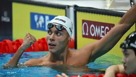 Înotătorul român David Popovici în finalele probei de 100 m. Campionul mondial a înregistrat cel mai bun timp