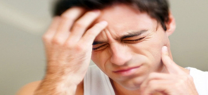 persoană care acuză durere de măsea