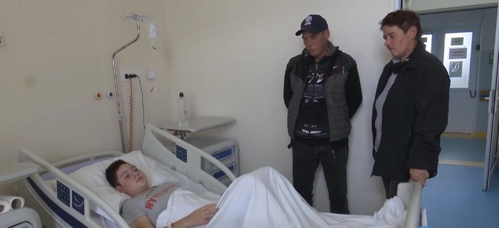  poză cu părinții băiatului de 13 ani