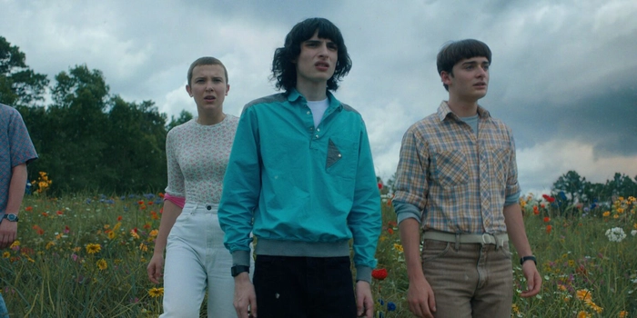 o poză cu trei actori din Stranger-Things