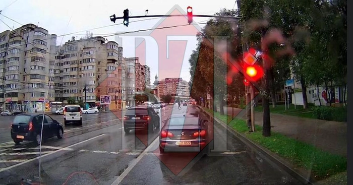  soferii masinilor BMW si un Passat trecand pe rosu