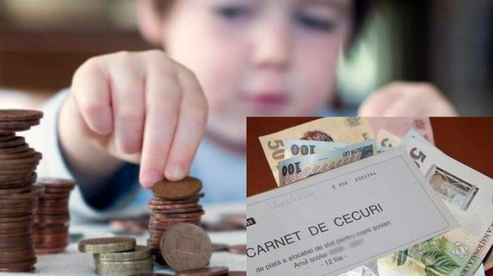 copil care numără banii din alocație
