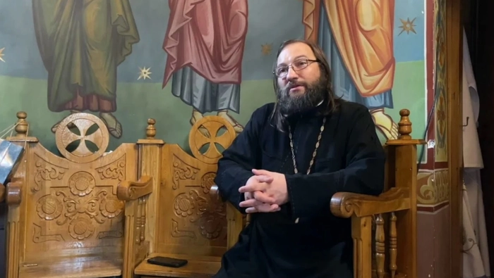 o poză cu părintele Dan Damaschin