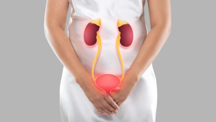 grafica femeie care se tine de burta din cauza infectiei urinara
