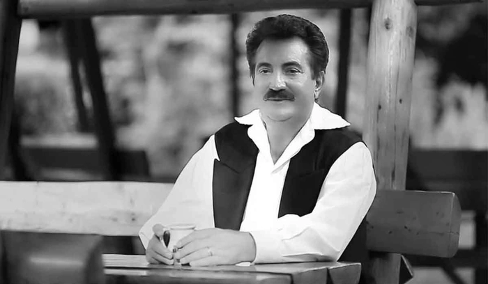 Petrică Mâțu Stoian în cămașă albă și vestă neagră