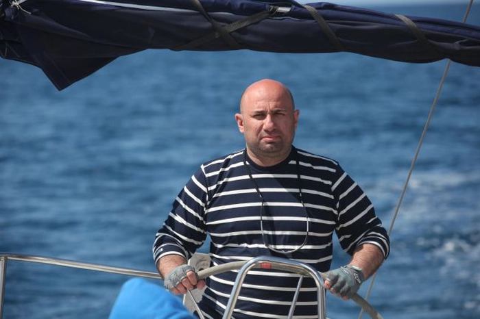 chef Cătălin Scărlătescu pe barcă