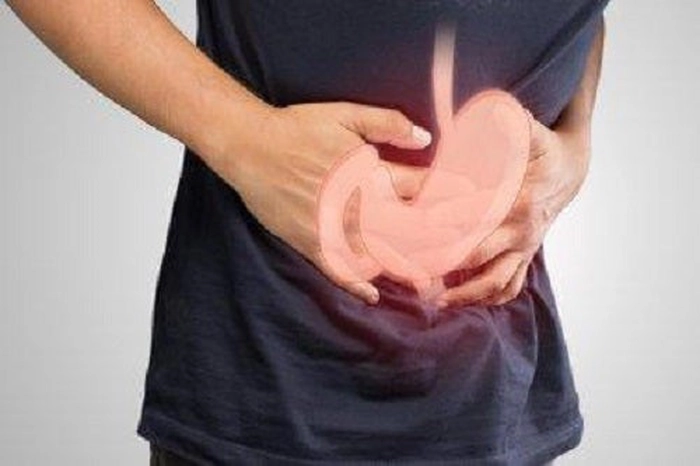 persoană care suferă de gastrită