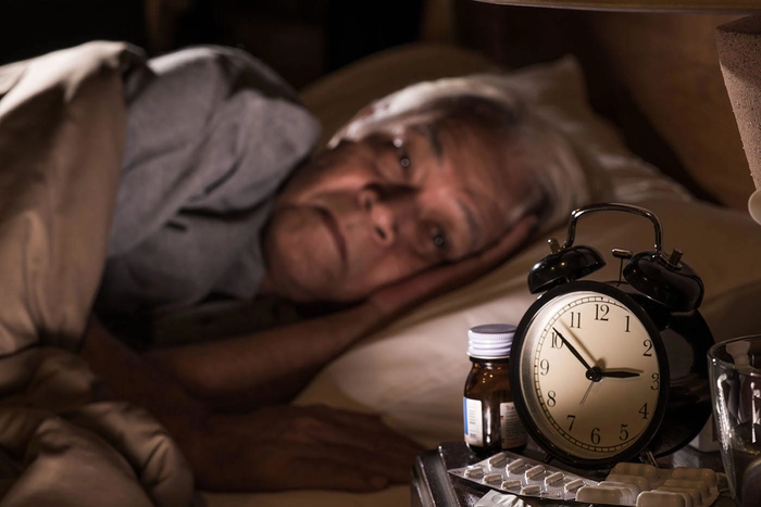 persoana care sufera de insomnie