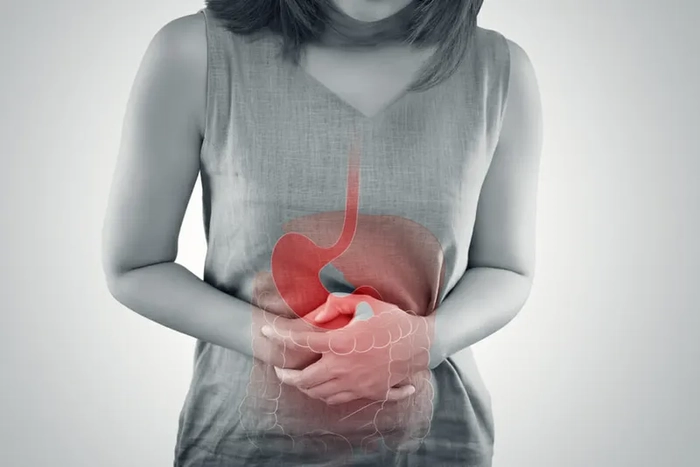 grafica persoana care se tine de burta din cauza bacterii helicobacter pylori