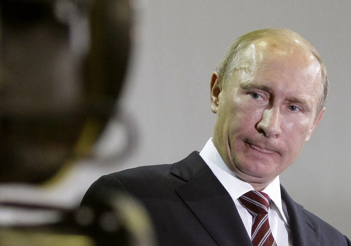 Ruşii acuzaţi că au folosit arme ilegale, presedintele rus Vladimir Putin