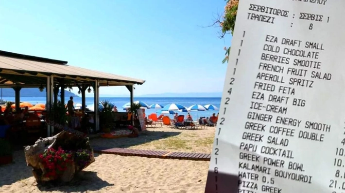 Prețul plătit de 3 turiști pentru o zi de plajă în Thassos. Cum a arătat nota de plată pentru șezlonguri, bere și mâncare
